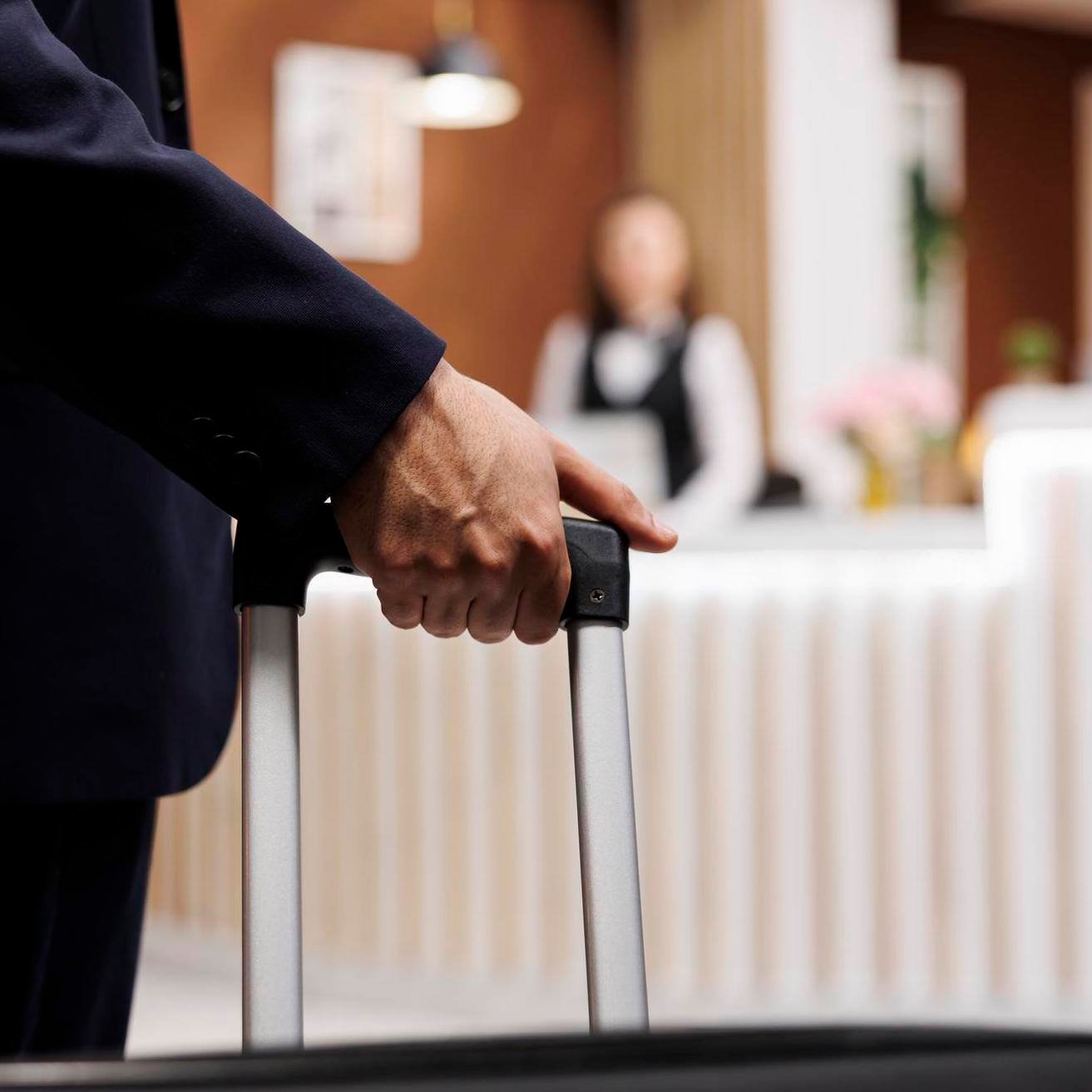 businessman-arriving-hotel-lobby